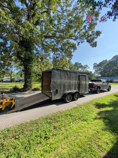Lawn Heros truck and trailer — ready for work